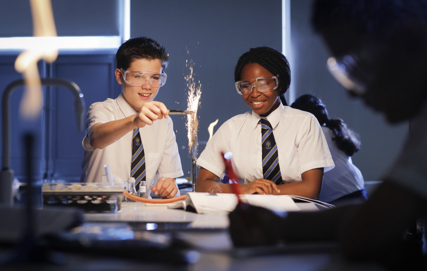 Pupils experimenting in a science lab